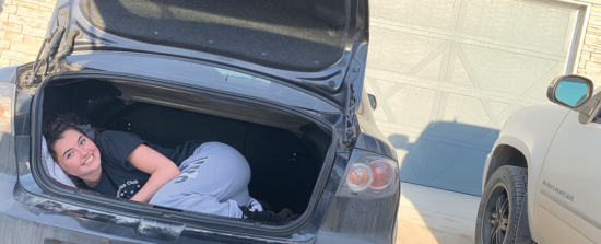 Student hiding in the trunk of a car