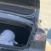 Student hiding in the trunk of a car